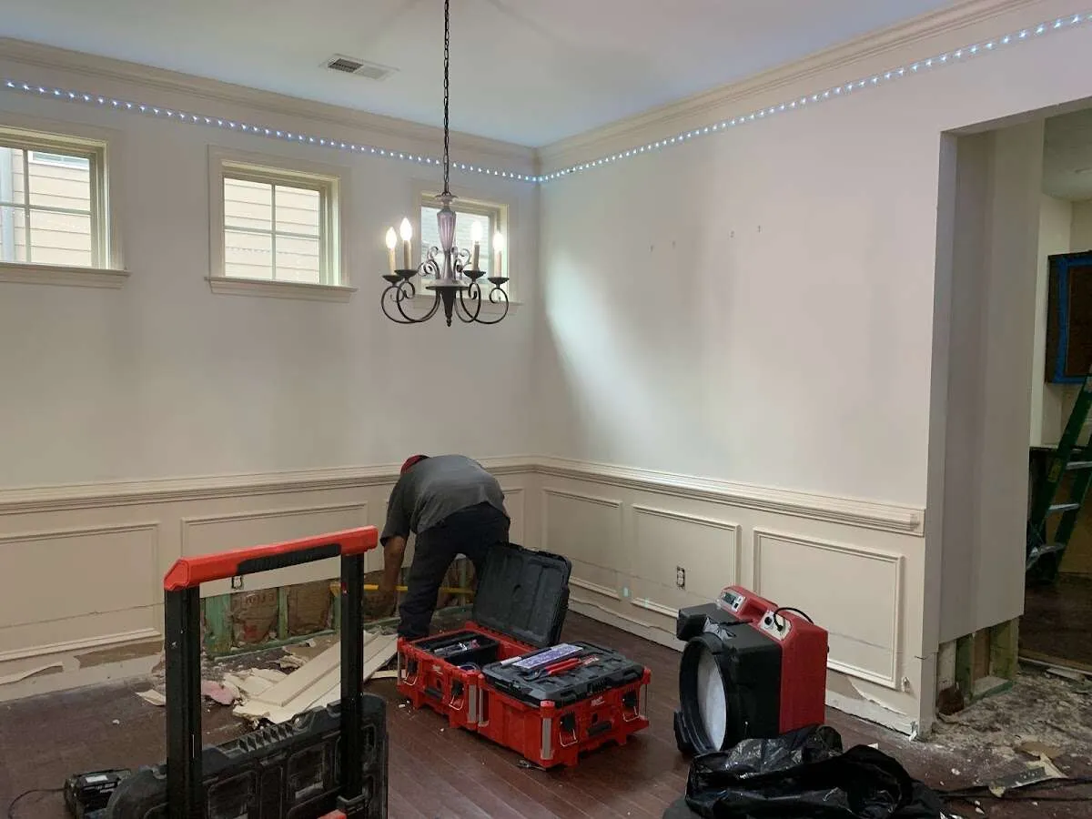 Restoration technician with professional equipment in Woodstock